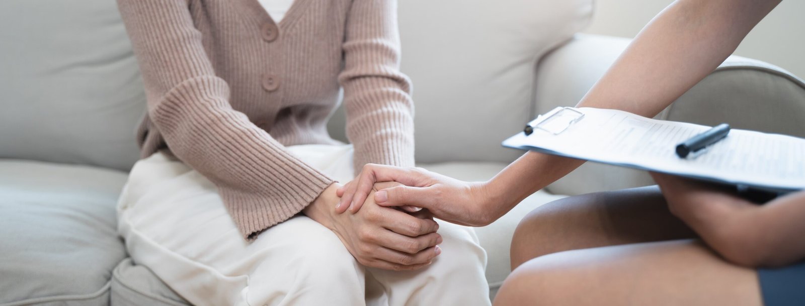 therapist reassuring client during therapy session
